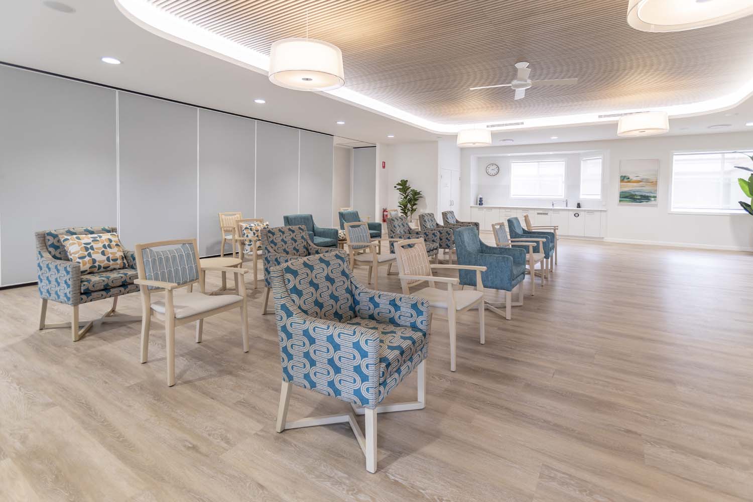 Armchairs in activity community space in retirement living