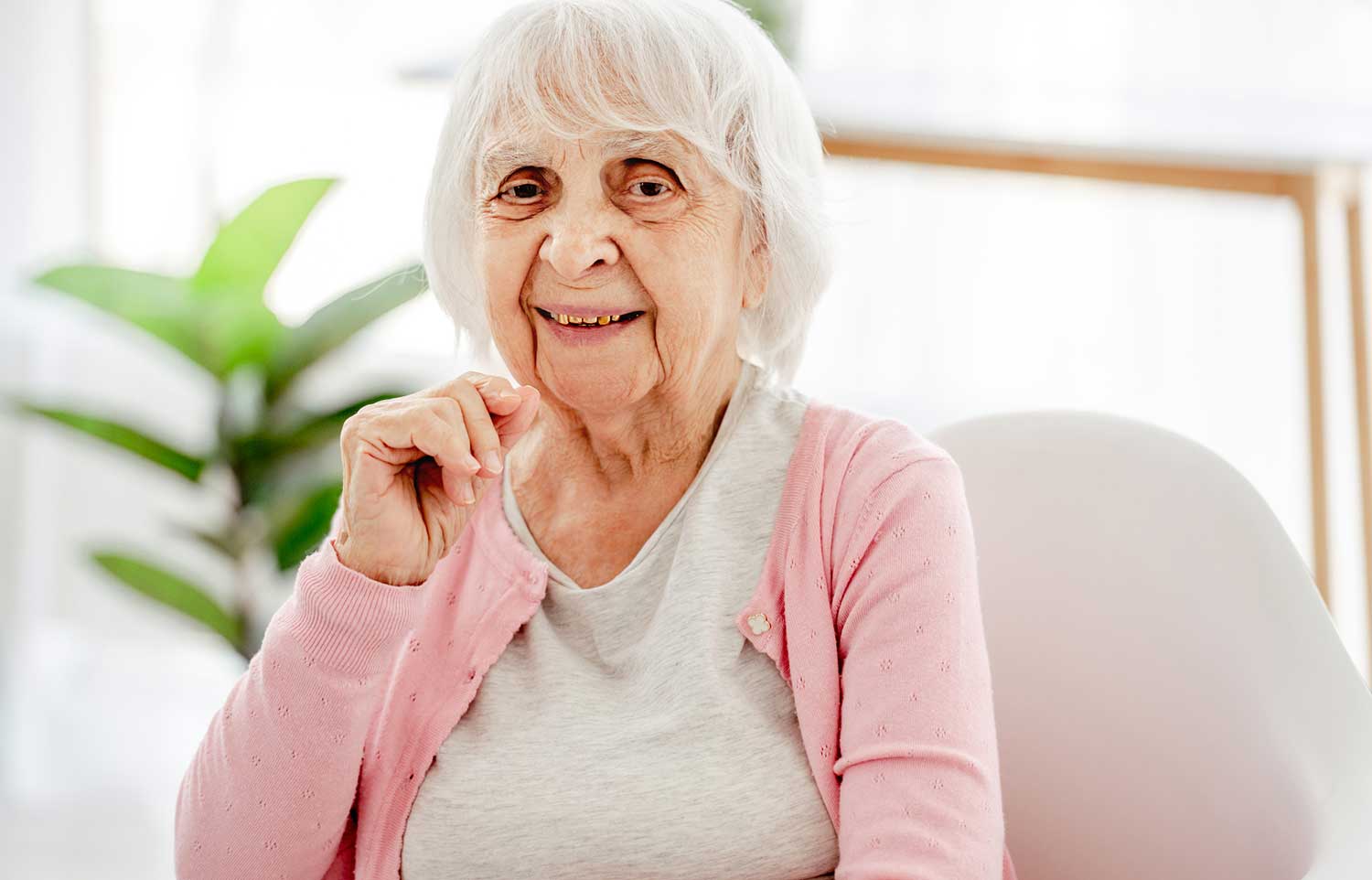 woman sitting in aged care chair