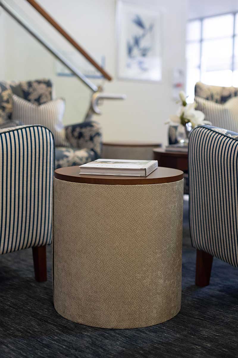 Upholstered side table by FHG at Boondall retirement village