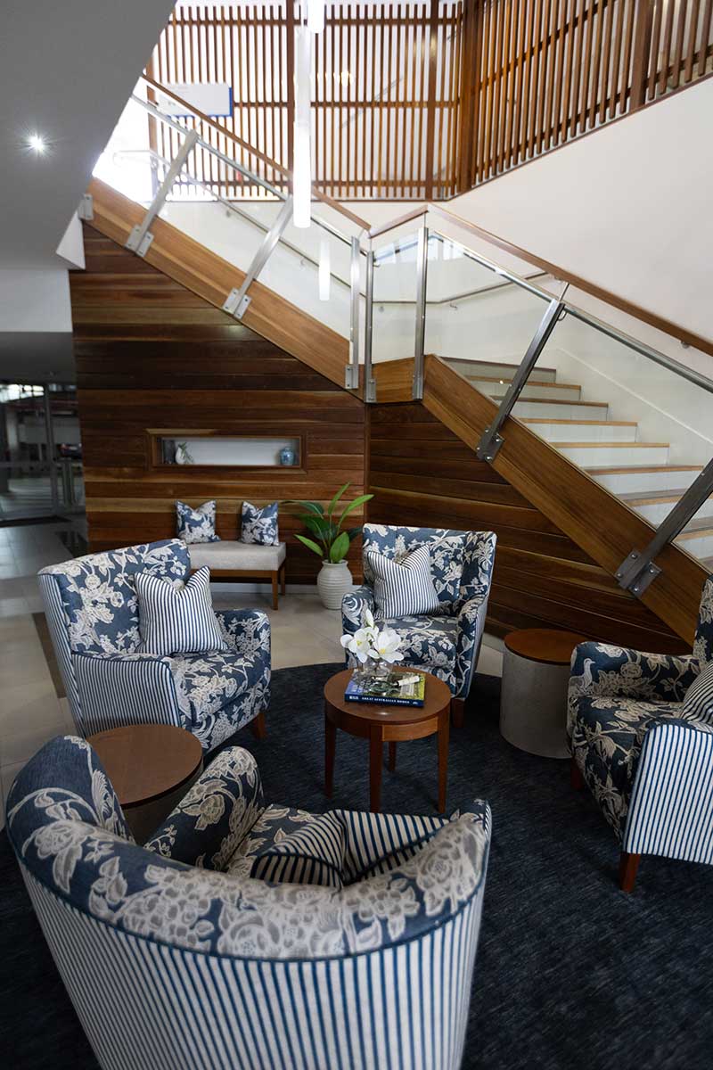 Foyer with furniture and stairs at Brisbane retirement village