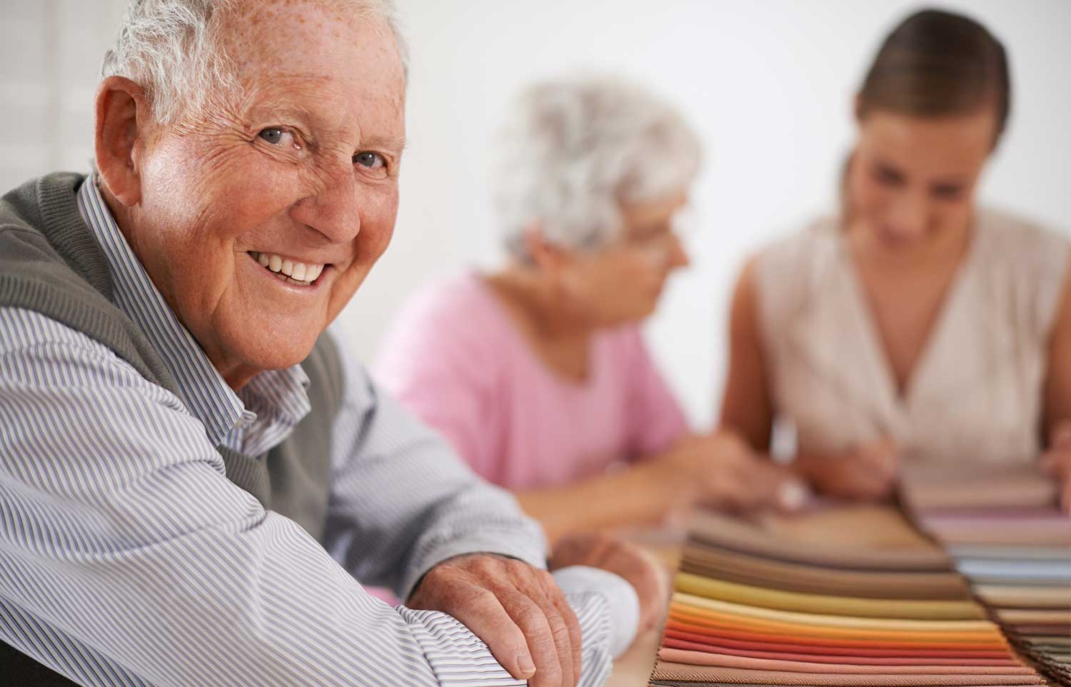 elderly people choosing upholstery fabrics elderly people choosing upholstery fabrics