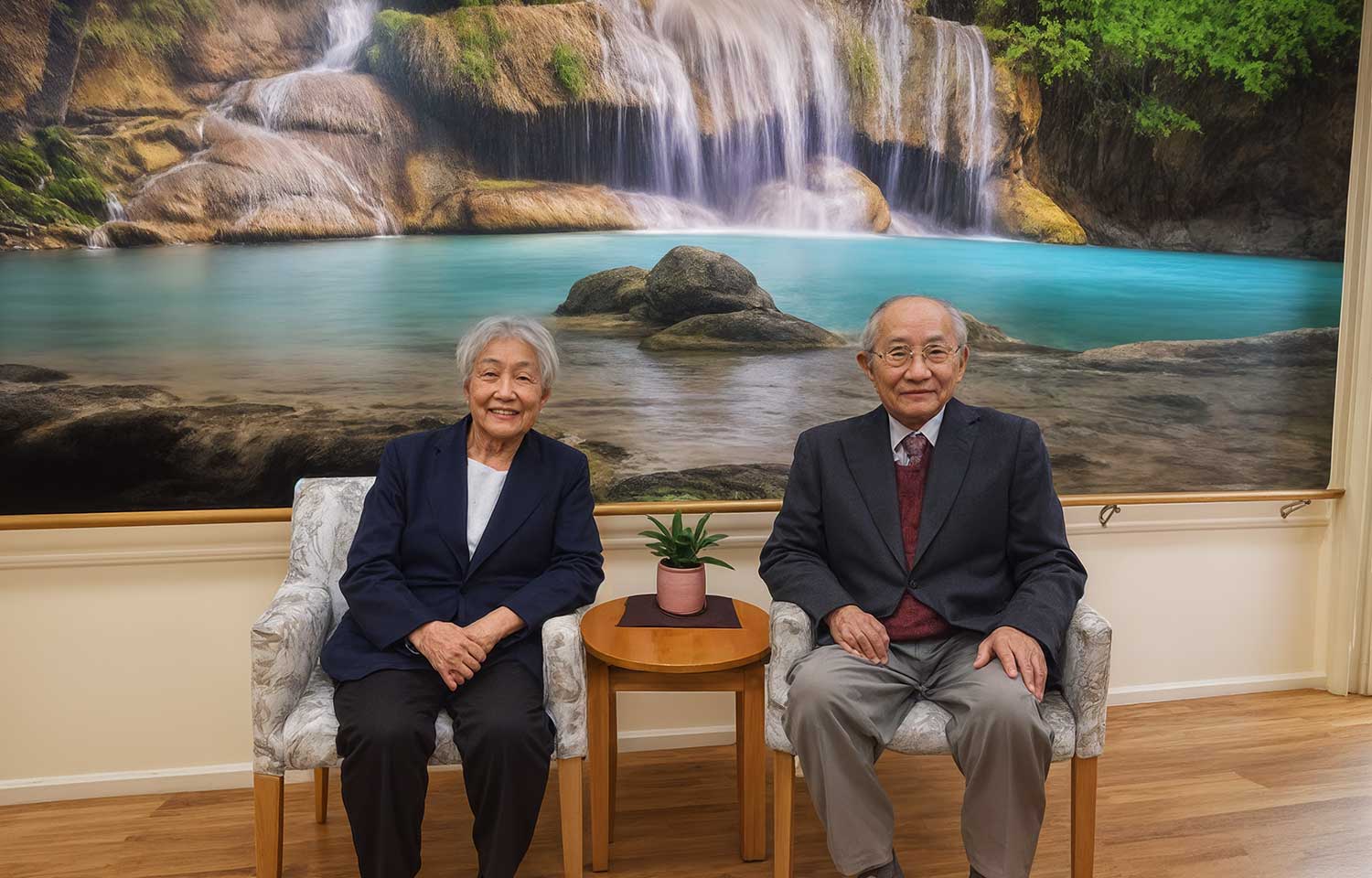 Elderly people sitting in an aged care interior